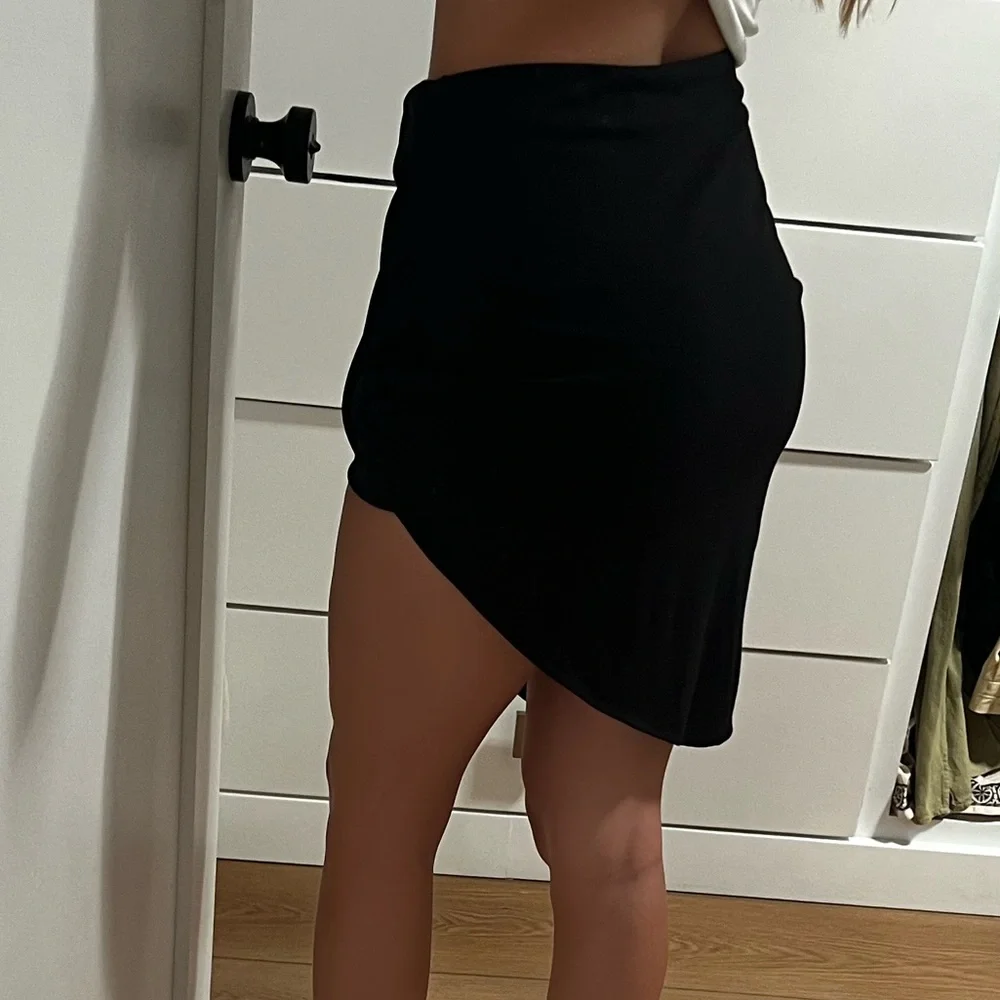 Elegant Black Draped Asymmetric Skirt - Picture 3 of 3